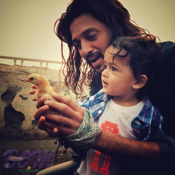 A cute pic of Riteish Deshmukh with his son Riaan on the set of Banjo movie