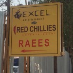 A display banner of Excel Entertainment and Red Chillies Entertainment 'Raees'