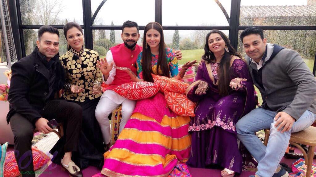 A group pic of Anushka and Virat with other special guests on marriage