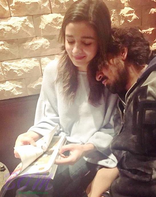 A stranger resting on the shoulders of Alia Bhatt