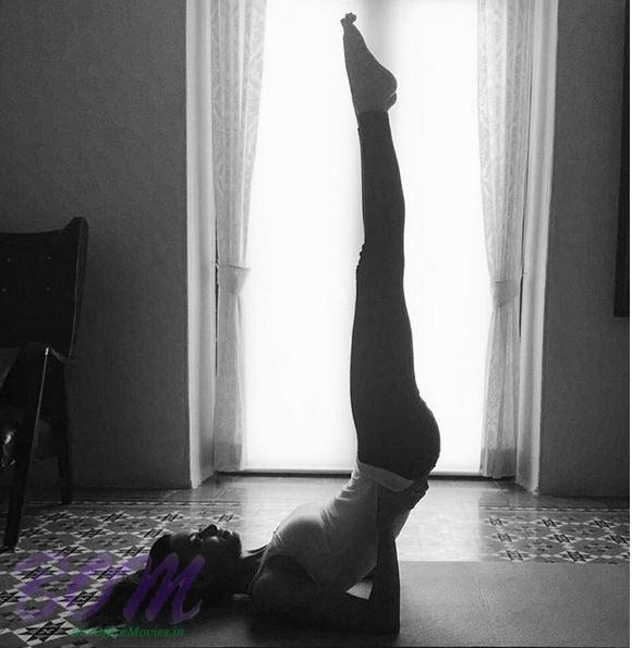 Diana Penty doing Sarvangasana yoga