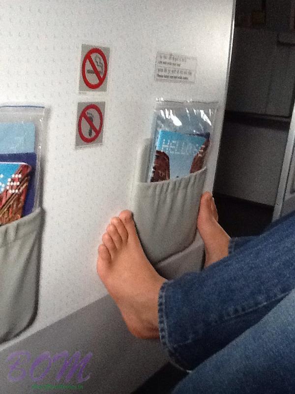 Dino Morea shared this informational picture says 'On my flight to Chandigarh. Don't people read the signs anymore. Clearly says feet not allowed. '
