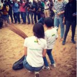 Divya Khosla Kumar with his son while cleaning up the beach