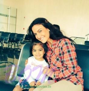 Elli Avram with little Doll - really touched my heart at Indore airport