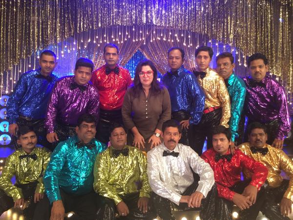 Farah Khan gives credit of a HNY Movie song to the dressed spot boys in this picture