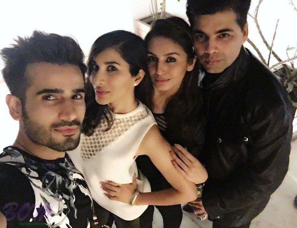 A picture of pilates girls Huma Qureshi and Sophie Choudry with Karan Johar