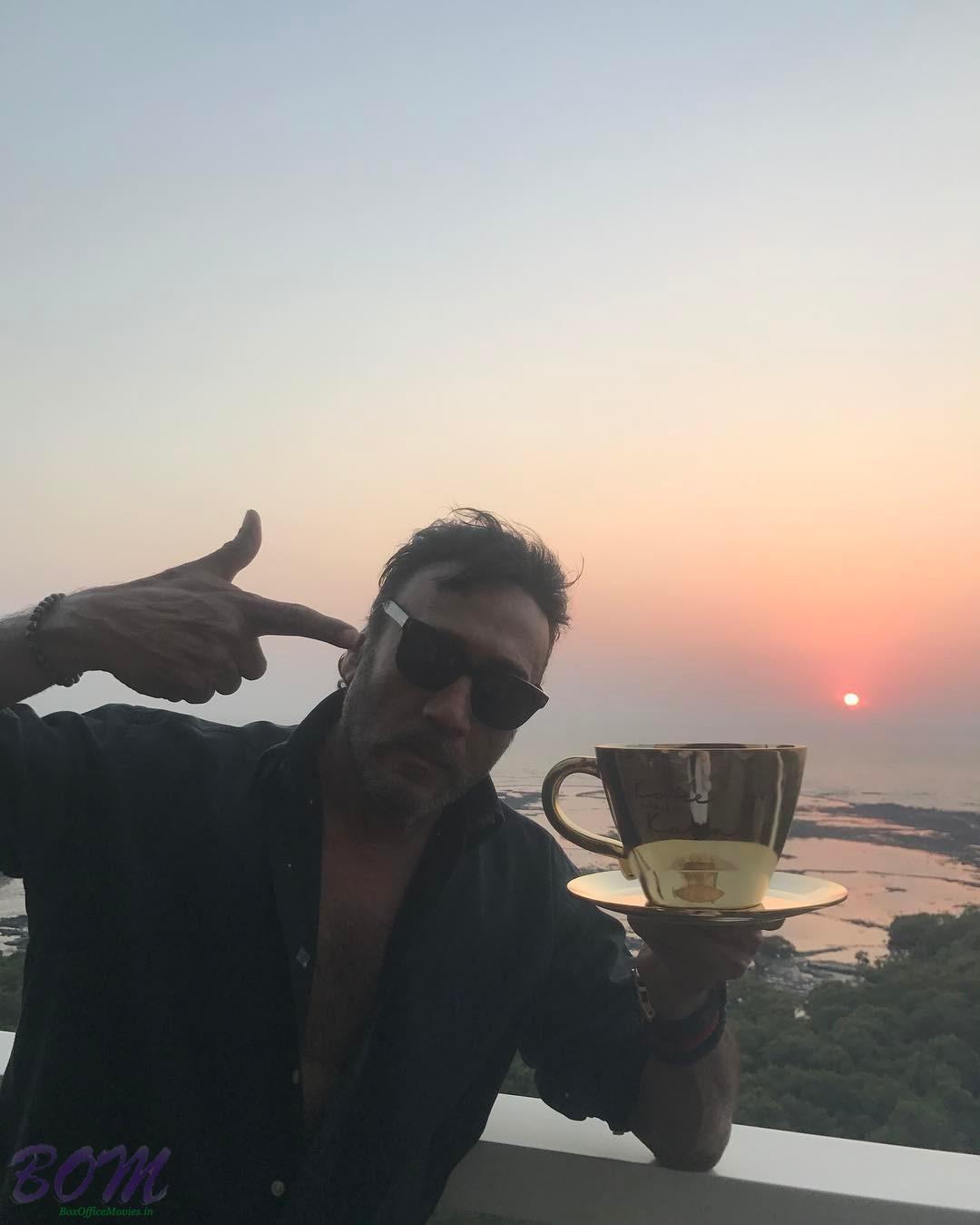 Jackie Shroff with a cup of coffee for Karan Johar show