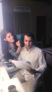 Jacqueline Fernandez doing makeup of Chetan Bhagat