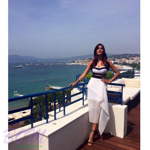 Katrina Kaif wears Manolo Blahnik Chaos black suede sandals and jewellery by Maria Francesca Pepe at Cannes