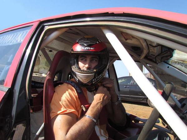 Kunal Kapoor Racing Picture - Racing Mornings. Helmet, dirt track and a souped up iron cage. Vroom. Movie or Hobby - just guess