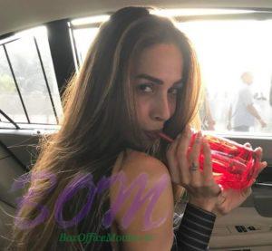 Malaika Arora Khan with her travel companion red mason jar