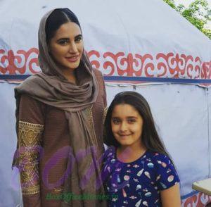 Nargis Fakhri with a child artist from Torbaaz
