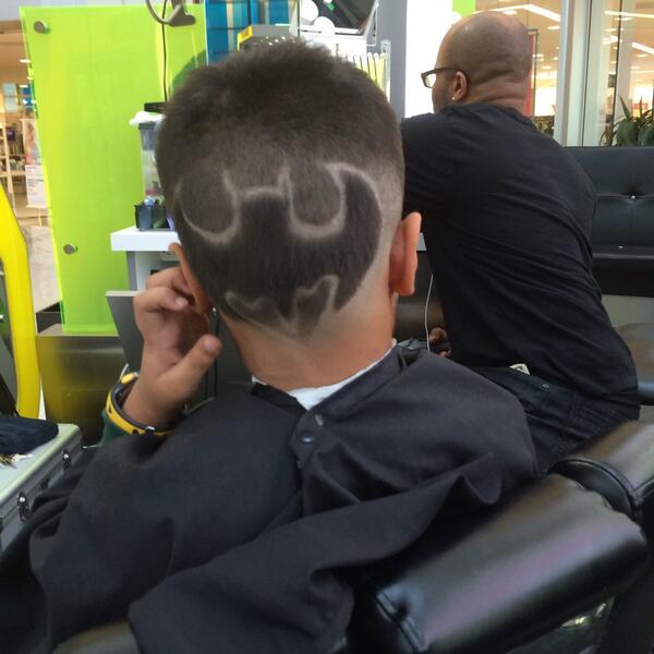 Raveena Tandon shared this pic 'Gets himself a batman haircut, And patiently sat through An hour and a half, Is a big super hero fan'