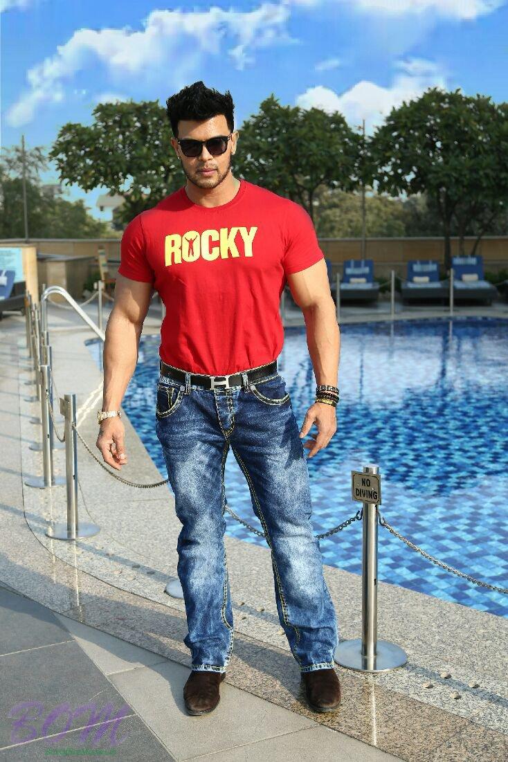 Sahil Khan beside a pool