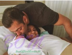 Salman Khan showers his new born nephew Ahil with kisses as sister Arpita smiles on.