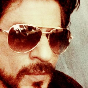 Shahrukh Khan wearing a glare given by Sonu Sood on 15 July 2014