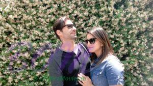 Sunny Leone and Daniel Webber with a wall of Jasmine