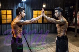 Varun Dhawan mirror reflection with 8 Pack abs