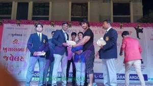Vidyut Jammwal giving the belts in Surat in a black belt cermony