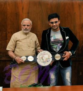 Wrestler and Actor SANGRAM SINGH with Narendra Modi Ji with the belt