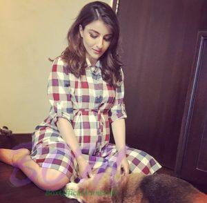 Soha Ali Khan with her dog while posing for a pic during pregnancy.