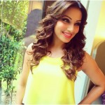 A cute picture of Bipasha Basu in yellow top