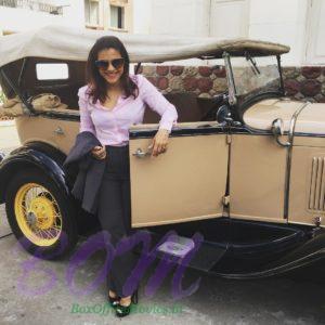 Kajol Devgn with a vintage car