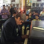 Mr. Bachchan playing the Charulata theme on the piano at St.Paul's Cathedral
