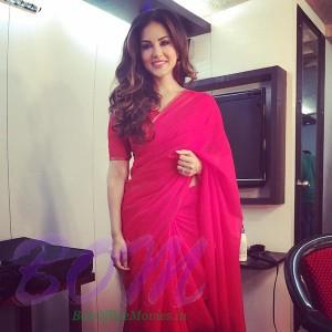 Sunny Leone looks beautiful in a simple red sari