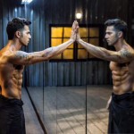 Varun Dhawan mirror reflection with 8 Pack abs