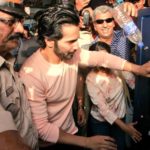 Varun Dhawan watching Plastic bottle crushing machine installed at juhu beach in Mumbai