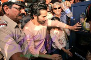 Varun Dhawan watching Plastic bottle crushing machine installed at juhu beach in Mumbai