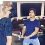 Varun Dhawan poses as Kattappa when swording to Prabhas